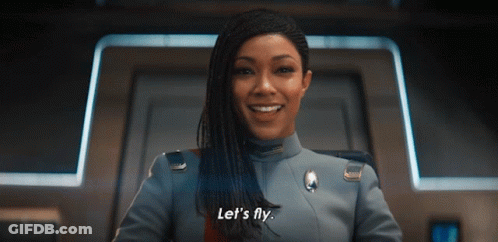A Woman In A Military Uniform Says Let 'S Fly GIF