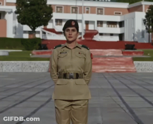 Woman In Military Uniform In Front Of Army Building GIF