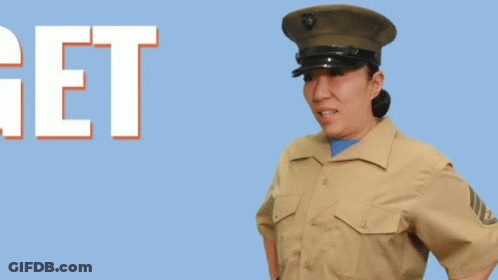 A Woman In A Military Uniform Stands In Front Of The Words Get To Work GIF