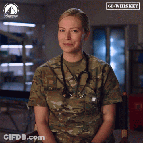 Woman In Military Uniform With Holloway Text GIF
