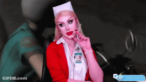 A Woman In A Nurse Costume Has A Badge That Says Staff On It GIF