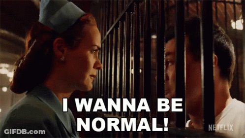 A Woman In A Nurse 'S Hat Says " I Wanna Be Normal " In Front Of A Man Behind Bars GIF