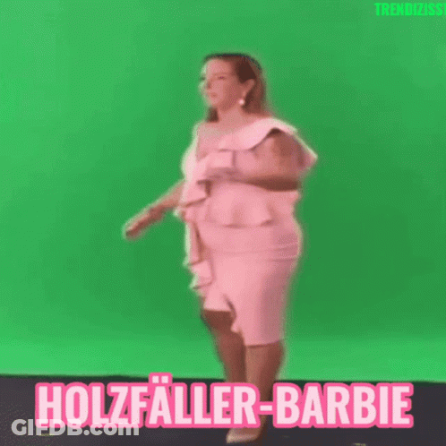 A Woman In A Pink Dress Is Dancing In Front Of A Green Screen With The Words Holzfaller-Barbie Written On It GIF