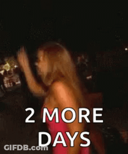 A Woman In A Pink Dress Is Dancing With Her Hand In The Air And The Words `` 2 More Days '' . GIF
