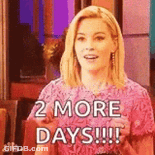 A Woman In A Pink Dress Is Saying `` 2 More Days !! '' GIF