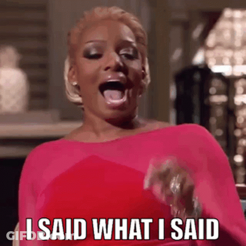 A Woman In A Pink Dress Is Saying I Said What I Said GIF
