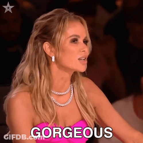 Woman In Pink Dress Says Gorgeous GIF