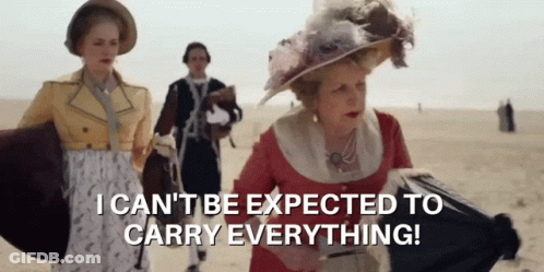 A Woman In A Pink Dress Says I Can 'T Be Expected To Carry Everything ! GIF