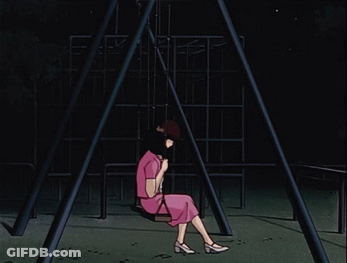 A Woman In A Pink Dress Sits On A Swing In The Dark GIF