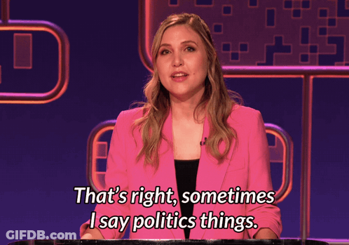 A Woman In A Pink Jacket Is Talking About Politics GIF
