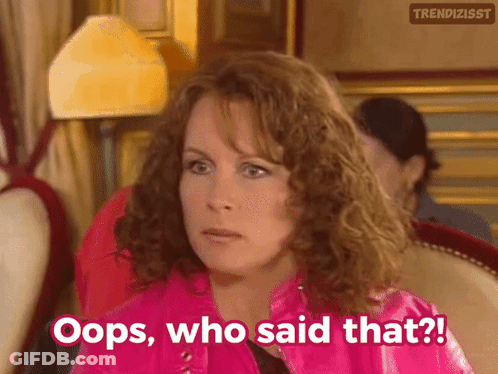 A Woman In A Pink Jacket Says Oops Who Said That ! GIF