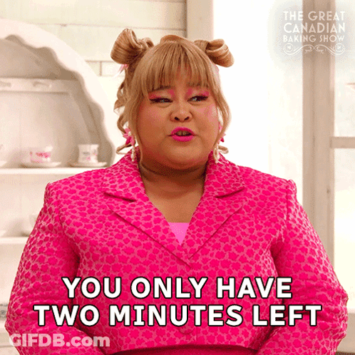A Woman In A Pink Leopard Print Jacket Says You Only Have Two Minutes Left GIF