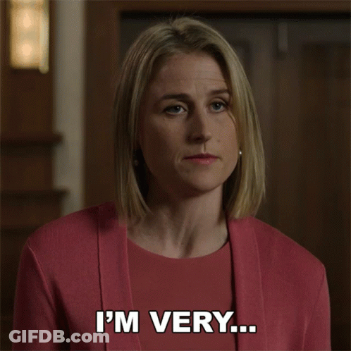 A Woman In A Pink Shirt Is Making A Funny Face And Says Embarrassed To Admit This GIF