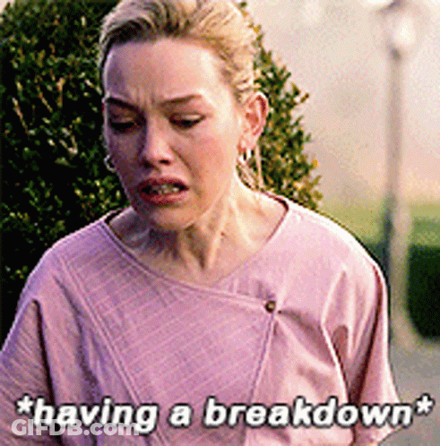 A Woman In A Pink Shirt Is Saying Having A Breakdown GIF