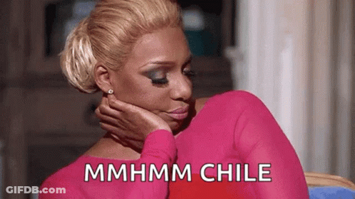 A Woman In A Pink Shirt Is Sitting Down With Her Hand On Her Face And The Words `` Mmhmm Chile '' Written On The Screen GIF