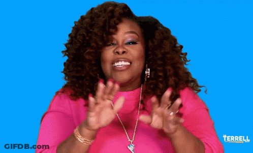 A Woman In A Pink Shirt Is Smiling In Front Of A Blue Background That Says Terrell On It GIF