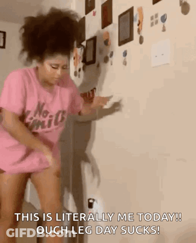 A Woman In A Pink Shirt Is Standing In Front Of A Wall And Saying This Is Literally Me Today ! GIF