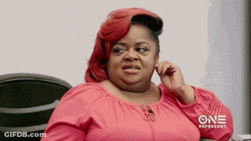 A Woman In A Pink Shirt Is Talking On A Cell Phone With One Represent Written On The Bottom GIF