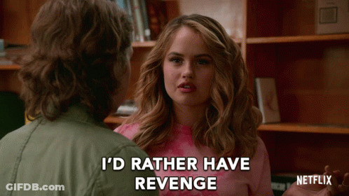 A Woman In A Pink Shirt Says I 'D Rather Have Revenge While Talking To A Man GIF