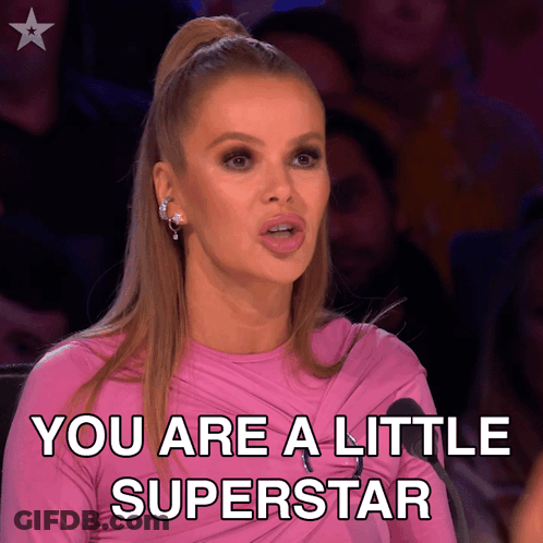 A Woman In A Pink Shirt Says You Are A Little Superstar GIF