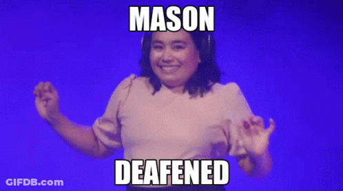 A Woman In A Pink Shirt With Mason Deafened Written On The Bottom GIF