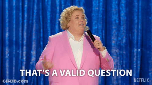 A Woman In A Pink Suit Is Holding A Microphone And Saying That 'S A Valid Question GIF