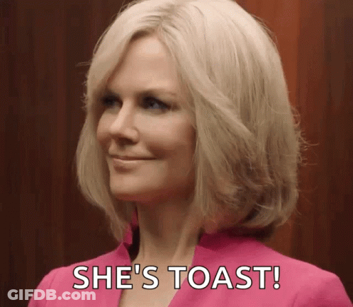 A Woman In A Pink Suit Says She 'S Toast . GIF