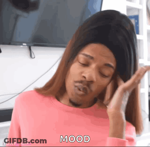A Woman In A Pink Sweater Is Making A Funny Face And The Word Mood Is On The Screen GIF