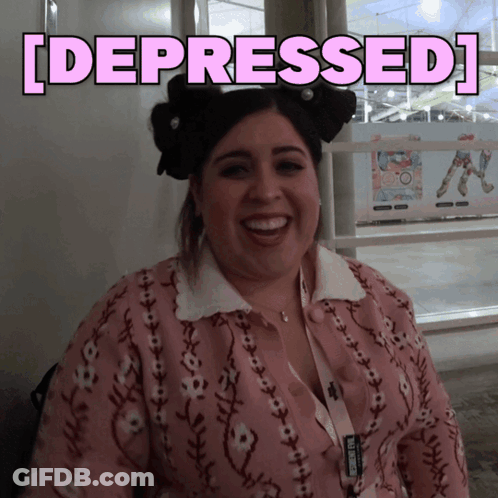 A Woman In A Pink Sweater Is Smiling With The Words [ Depressed ] Behind Her GIF