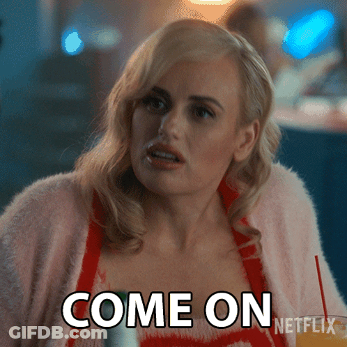 A Woman In A Pink Sweater With The Words Come On Netflix On Her Chest GIF
