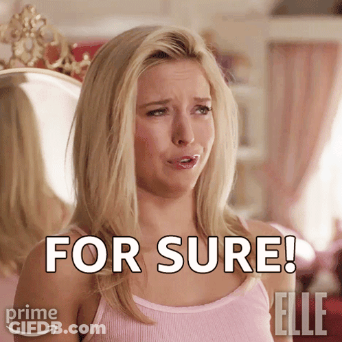 A Woman In A Pink Tank Top Says For Sure In Front Of A Mirror GIF