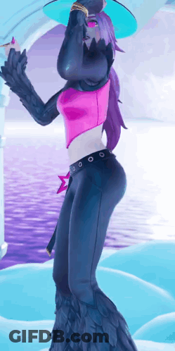 A Woman In A Pink Top And Black Pants Is Standing In Front Of A Waterfall . GIF