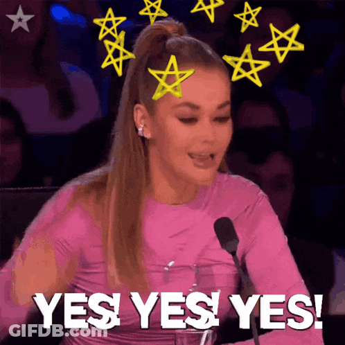 A Woman In A Pink Top Is Saying Yes Yes Yes GIF