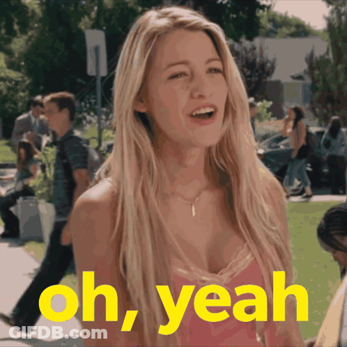 A Woman In A Pink Top With The Words Oh Yeah Behind Her GIF