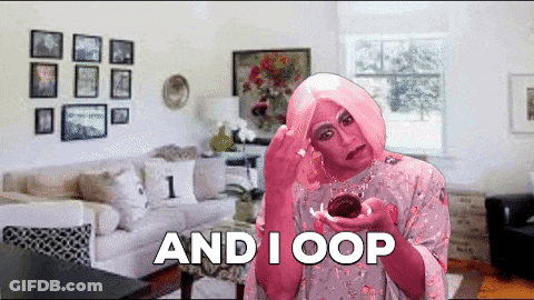 A Woman In A Pink Wig Is Holding A Cupcake And Says " And I Oop " GIF