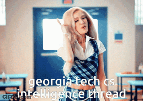 A Woman In A Plaid Dress Is Standing In A Classroom With The Words " Georgiatech Cs Intelligence Thread " On The Bottom GIF