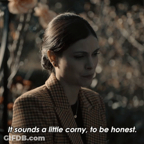 A Woman In A Plaid Jacket Is Saying It Sounds A Little Corny To Be Honest GIF