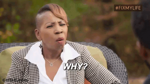 A Woman In A Plaid Jacket Is Sitting On A Couch And Asking Why . GIF