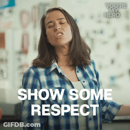 A Woman In A Plaid Shirt Is Making A Face And Says Show Some Respect GIF