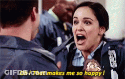 A Woman In A Police Uniform Is Screaming At A Man In A Police Uniform . GIF