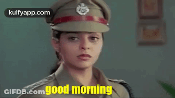 A Woman In A Police Uniform Is Wearing A Hat And Saying Good Morning . GIF