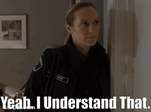 A Woman In A Police Uniform With The Words Yeah I Understand That On The Bottom GIF