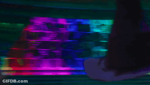 A Woman In A Purple Coat And Black Hat Is Standing In Front Of A Bar GIF