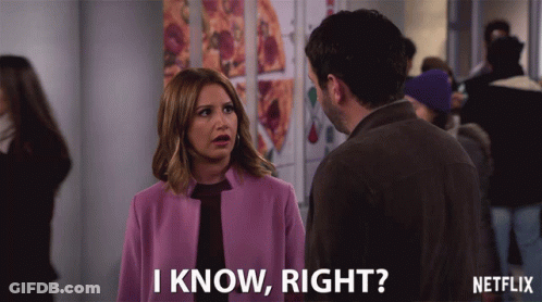 A Woman In A Purple Coat Is Talking To A Man And Says " I Know Right " GIF