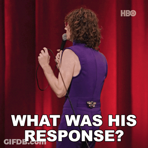 A Woman In A Purple Dress Is Holding A Microphone And Saying What Was His Response GIF