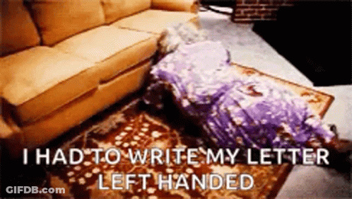 A Woman In A Purple Dress Is Laying On The Floor Next To A Couch And A Rug . GIF