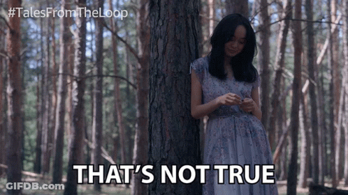 A Woman In A Purple Dress Is Leaning Against A Tree In The Woods And Says That 'S Not True GIF