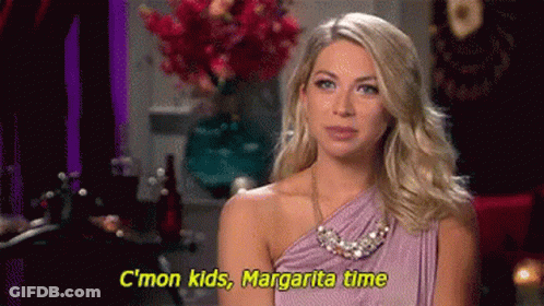 A Woman In A Purple Dress Is Saying C'mon Kids , Margarita Time . GIF