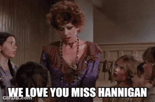 A Woman In A Purple Dress Says We Love You Miss Hannigan To A Group Of Girls GIF