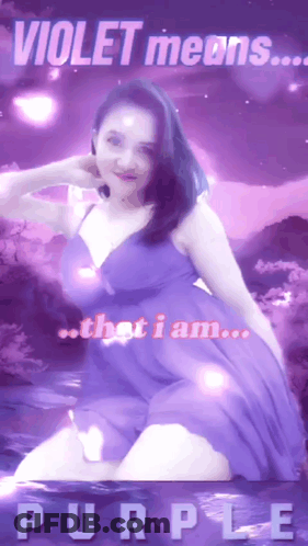 A Woman In A Purple Dress With The Words Violet Means That I Am Purple On The Bottom GIF